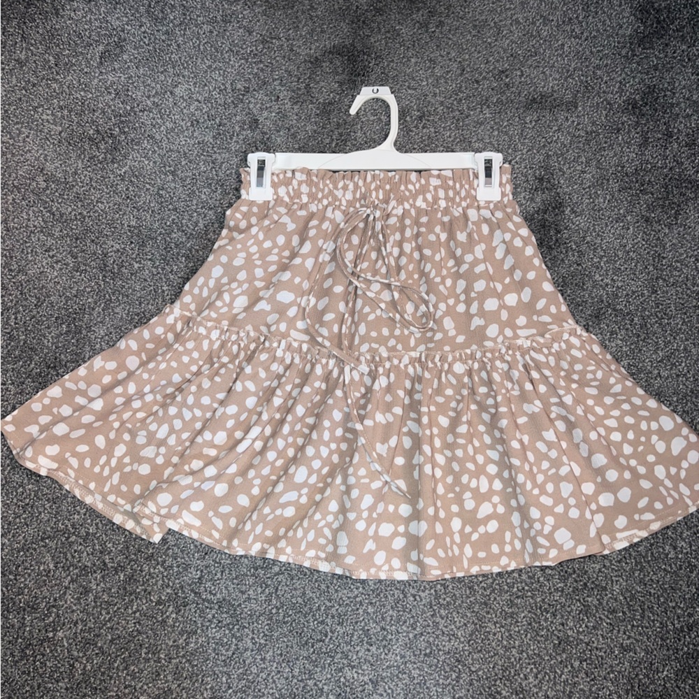Brown skirt with white polka dots